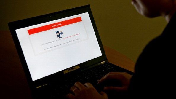 This illustration picture set up on January 4, 2013 shows a laptop screen displaying a denial of access message on the homepage of 'Annals of the Yellow Emperor' in Beijing.