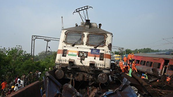 escue workers and military personnel gather around damaged carriages at the accident site of a three-train collision near Balasore, about 200 km (125 miles) from the state capital Bhubaneswar in the eastern state of Odisha, on June 3, 2023