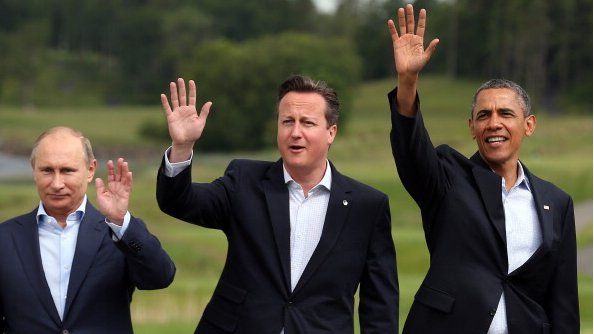From left to right: Vladimir Putin, David Cameron and Barack Obama wage for the cameras