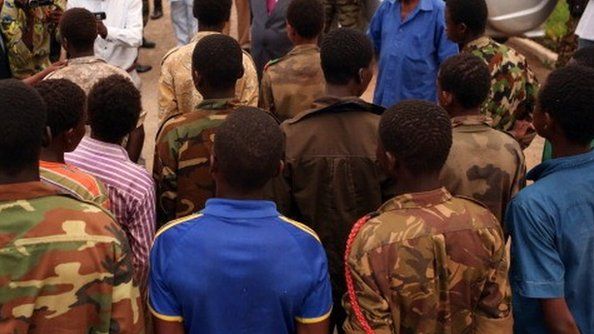 Children aged between 14 and 17 who were fighting in armed groups in CAR pictured in Bangui; about 21 of them were released following intervention from Unicef in May 2013