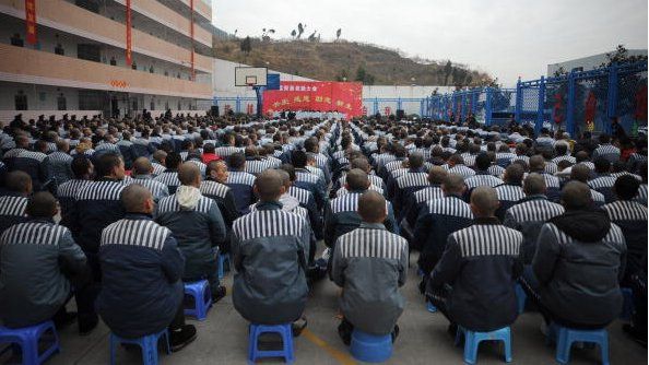 Inmates attend a ceremony to celebrate the upcoming Spring Festival at the Chuanxi Prison on January 24, 2009 in Chengdu of Sichuan Province, China.