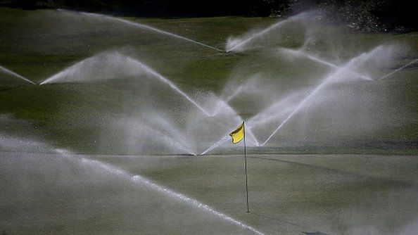 Sprinklers water the grass at Gleneagles Golf Course 2 April 2015 in San Francisco