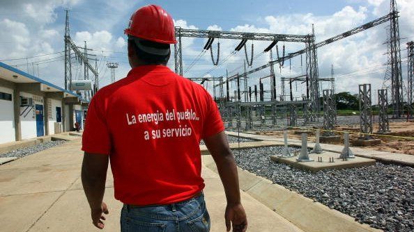 October 2, 2008 shows employees of the Venezuelan national electricity company inside an electric plant in San Fernando de Apure (southern Venezuela).