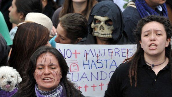 People march at Bogota's National Park on 3 June 3, 2012 to reject the brutal torture, rape and murder of 35-year-old Rosa Elvira Cely