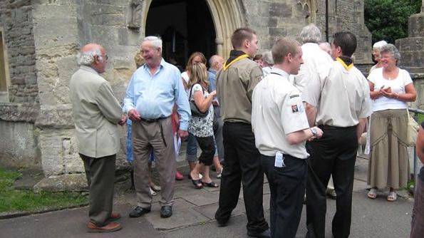 Pip and congregation leaving church