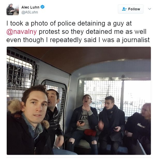 Tweet from Alec Luhn: I took a photo of police detaining a guy at @navalny protest so they detained me as well even though I repeatedly said I was a journalist