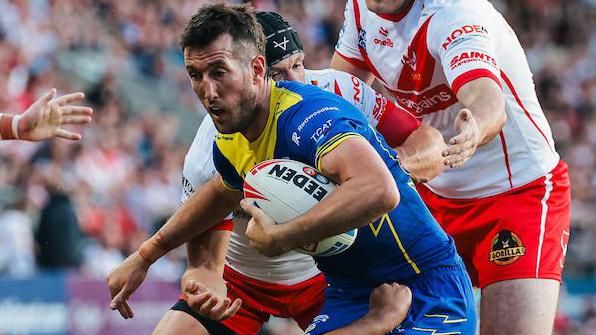 Rugby League - Betfred Super League: Round 18 - St Helens vs Warrington Wolves - Totally Wicked Stadium, St Helens, England - Stefan Ratchford of Warrington is tackled by James Bell and Noah Stephens of St Helens