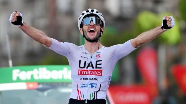 Adam Yates celebrates winning stage nine of the 2024 Vuelta a Espana