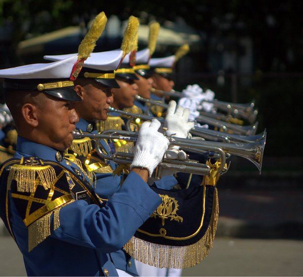 Indonesian Naval Academy band performing in a public park in Bangkok, Thailand