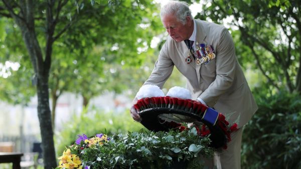 Prince Charles lays a wreath