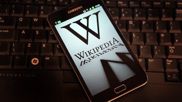 Wikipedia logo on phone