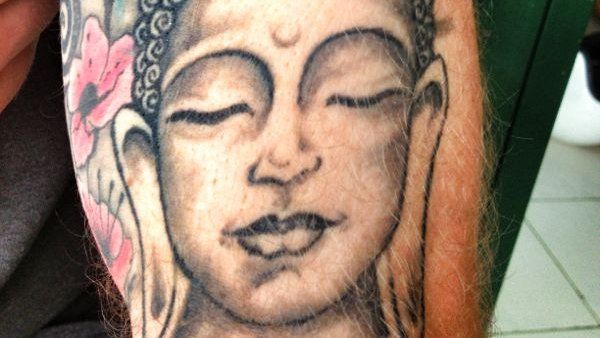 Buddha tattoo woman Naomi Coleman in legal action - BBC News