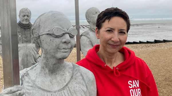Rose Bircham with some of the Sirens statues at Whitstable