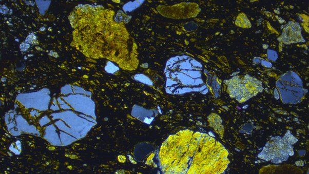 A thin section view of meteoritic ejecta deposit found on Skye