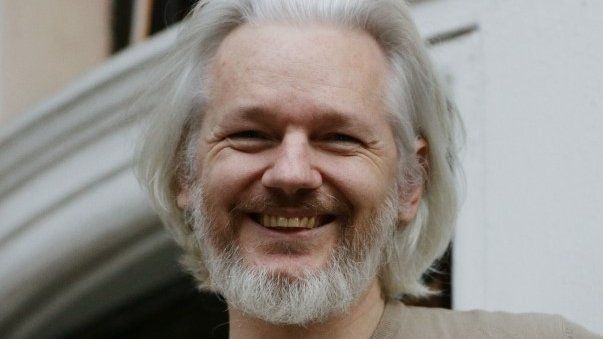 Julian Assange on the balcony of the Ecuadorean embassy in London, 25 November 2014