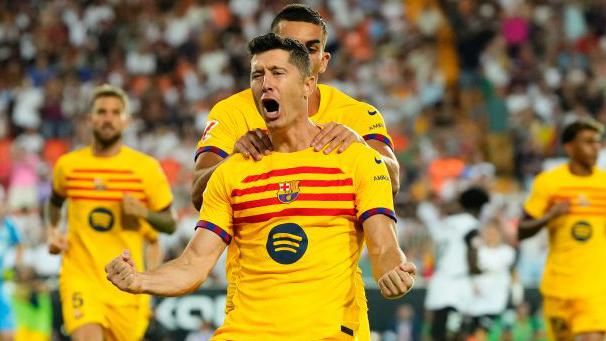 Robert Lewandowski celebrates after scoring for Barcelona