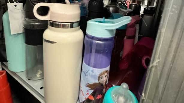 A collection of drinking flasks lost on Southeastern's trains