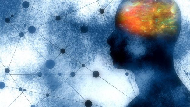 Scientific medical illustration: silhouette of a man's head, the brain is light up in orange, and the surrounding area is blue.
