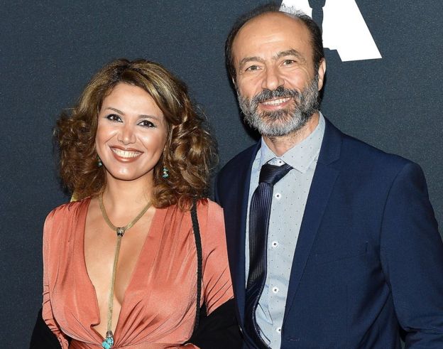 Jihad "Jay" Abdo and his wife Fadia Afashe smile at an event in California in 2017