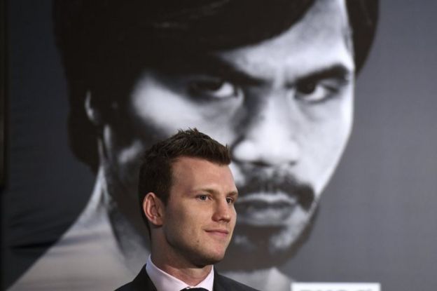 Jeff Horn diante de pôster de Pacquiao