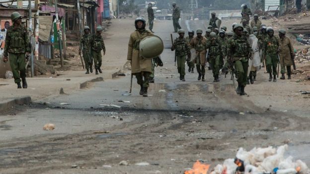 Police patrol the streets in Kawangware, Nairobi, Kenya, 12 August 2017