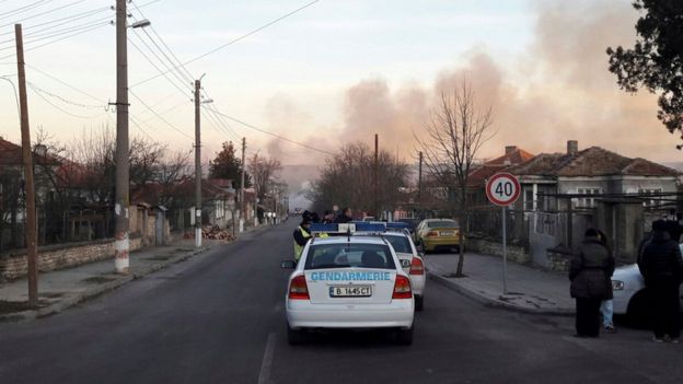 Smoke rises after a cargo train derailed and exploded in the village of Hitrino, Bulgaria, December 10, 2016.