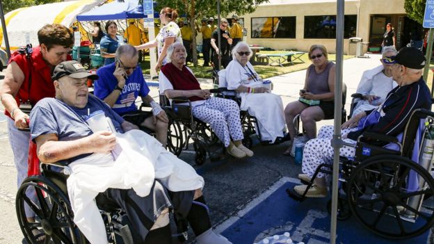 Evacuated patients rest under a shade of tent after being evacuated from Ridgecrest Regional Hospital GETTY IMAGES