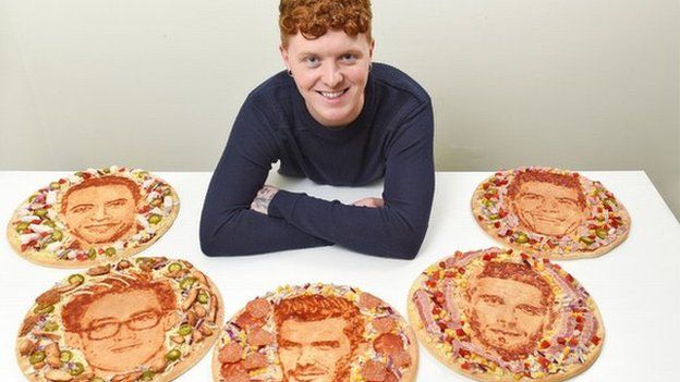 Artist Nathan Wyburn with pizza portraits