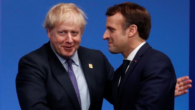 Britain"s Prime Minister Boris Johnson welcomes France"s President Emmanuel Macron at the NATO leaders summit in Watford,