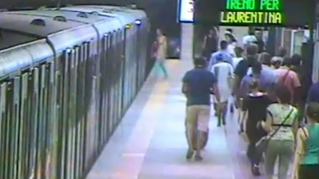 The woman can be seen boarding the train