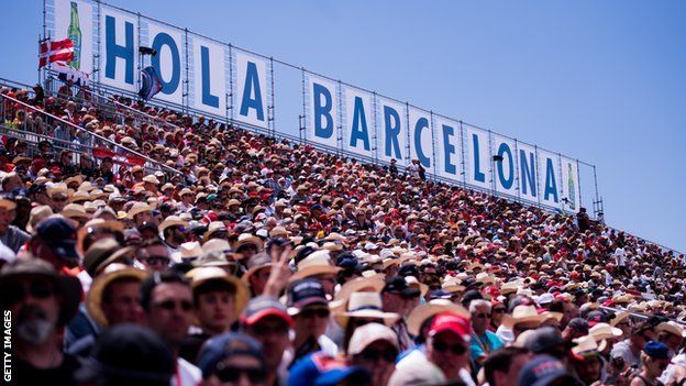 Fans watch the Spanish Grand Prix