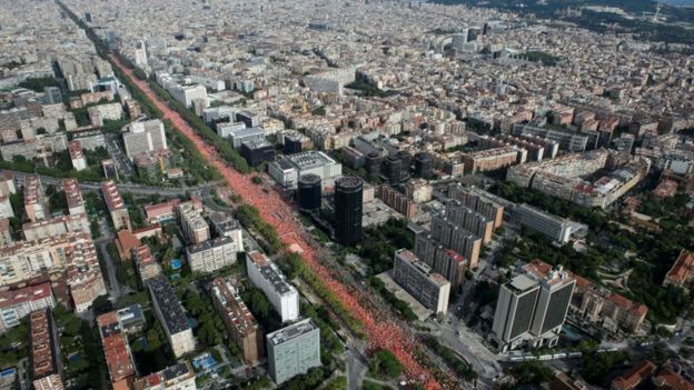 A line of red shirts in central Barcelona