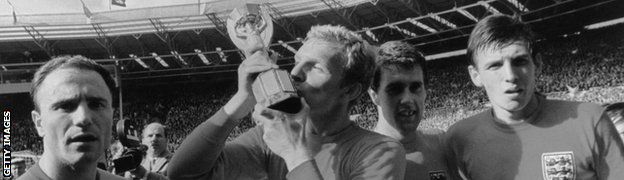 Bobby Moore kisses the World Cup after England's 1966 win