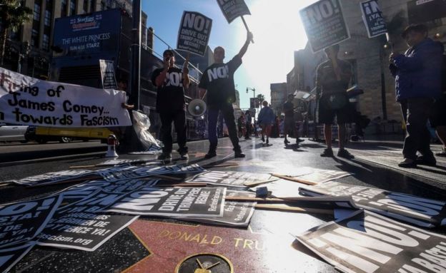   Protest in front of the star Trump. 