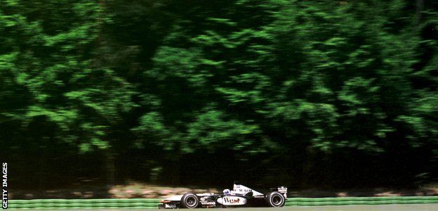 David Coulthard drives through the forest of the Hockenheimring in 2001
