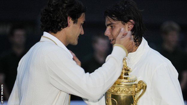 Roger Federer congratulates Rafael Nadal on his victory