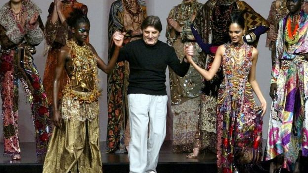 French designer Emanuel Ungaro appears with his models at the end of his Autumn-Winter 2002-2003 high fashion collection