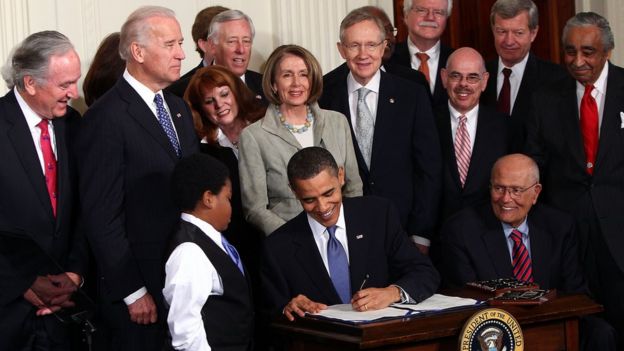 President Barack Obama signs the Patient Protection and Affordable Care Act into law in 2010