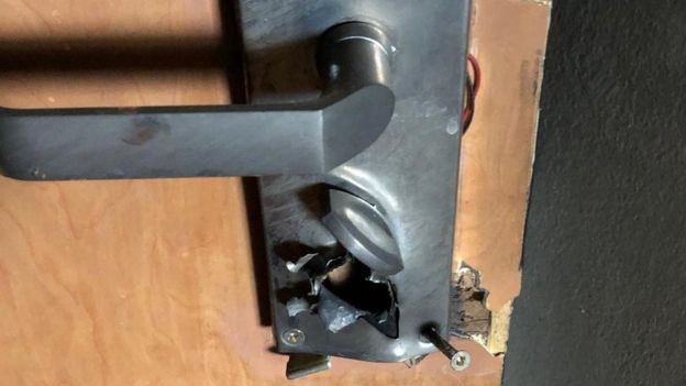 Gunmen shot through the lock on the door to Vasileios's room to gain entry