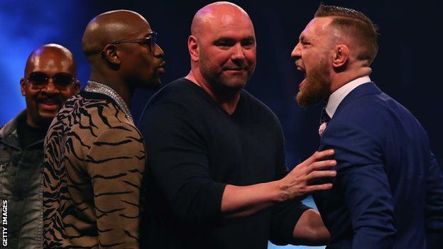 Dana White (centre) hoped to keep tickets out of the hands of brokers