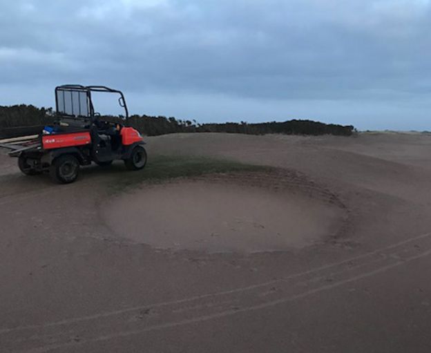 Tractor on gold course