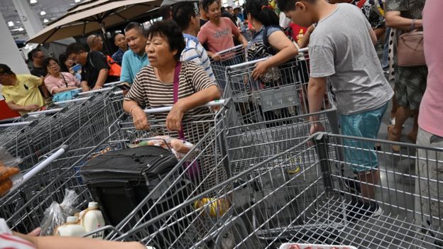 La gente en su visita a China.