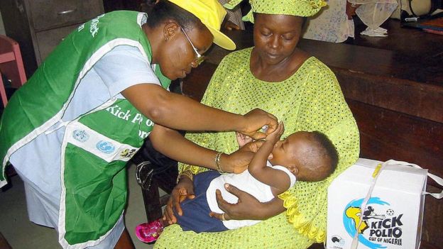 Child receiving vaccine