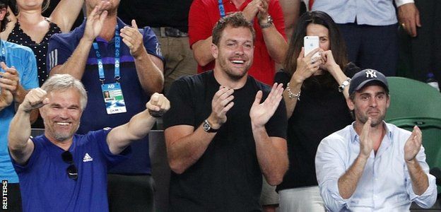 Piotr Wozniacki (L), coach and father of Caroline Wozniacki and her fiance David Lee celebrate