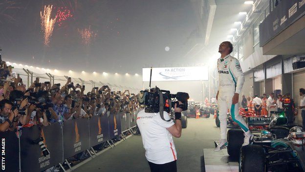 Lewis Hamilton celebrates at the end of the race