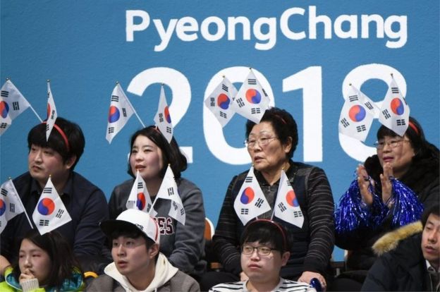 South Korea fans watch the curling women"s round robin session between South Korea and Britain during the Pyeongchang 2018 Winter Olympic Games at the Gangneung Curling Centre in Gangneung on February 17, 2018.