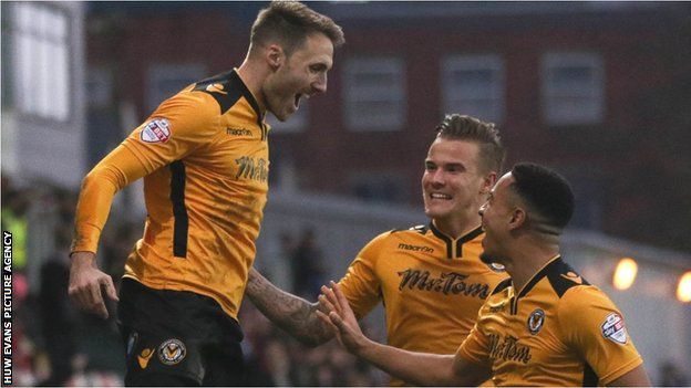 Alex Rodman celebrates his opening goal for Newport County