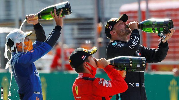 Norris, Bottas and Leclerc all celebrate with champagne