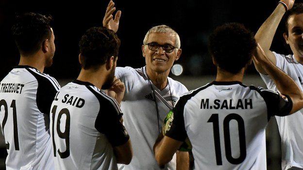 Egypt coach Hector Cuper speaks to his players during a training session