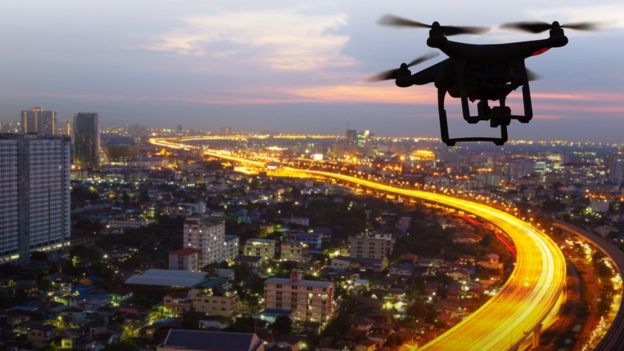 A drone flying over a city